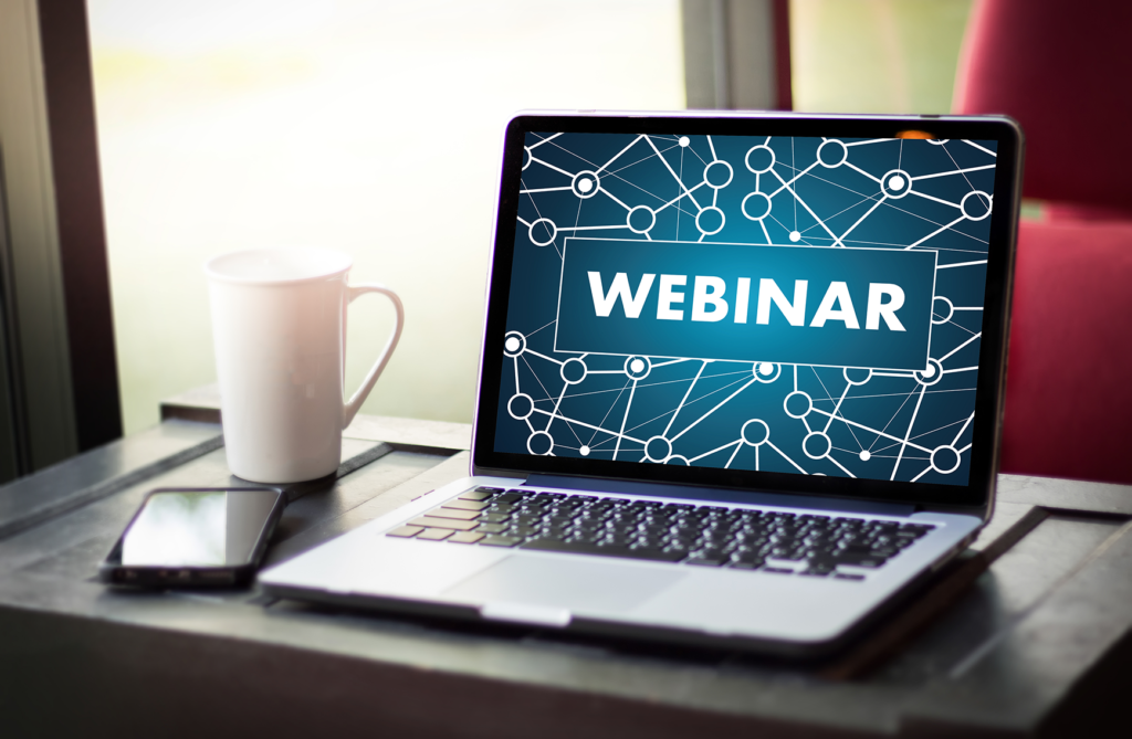 computer with webinar on screen